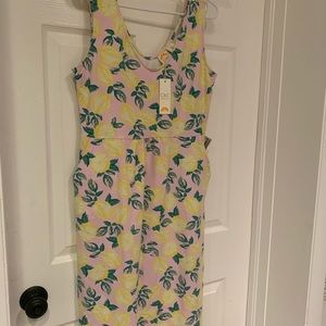 Pink dress with lemon pattern and pockets size L excellent condition